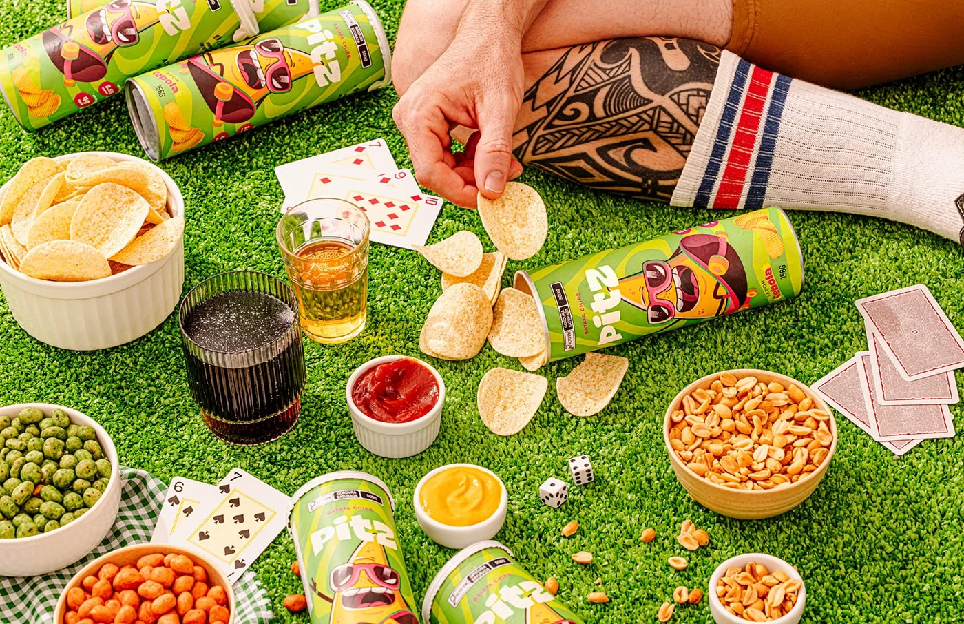 Vibrant Pitz snack packaging featuring a lively green and light color theme with engaging illustrations, capturing the essence of Brazilian energy and flavor.