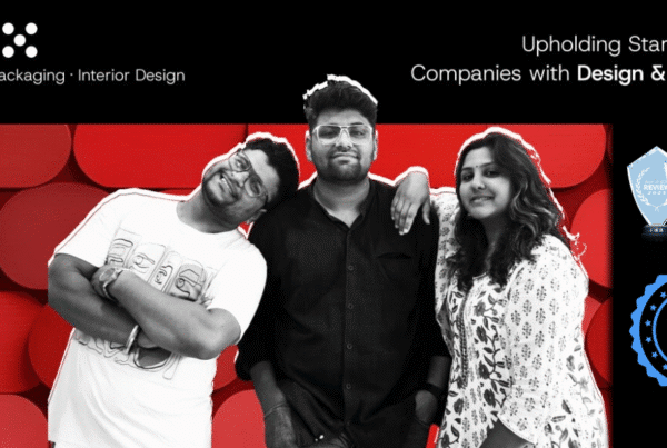 Professional team photo of The Factor X (TFX), a branding, packaging, and interior design agency based in Indore. The image features the three core team members against a bold, red geometric background. Text highlights their mission: 'Upholding Startups and Companies with Design & Strategy.