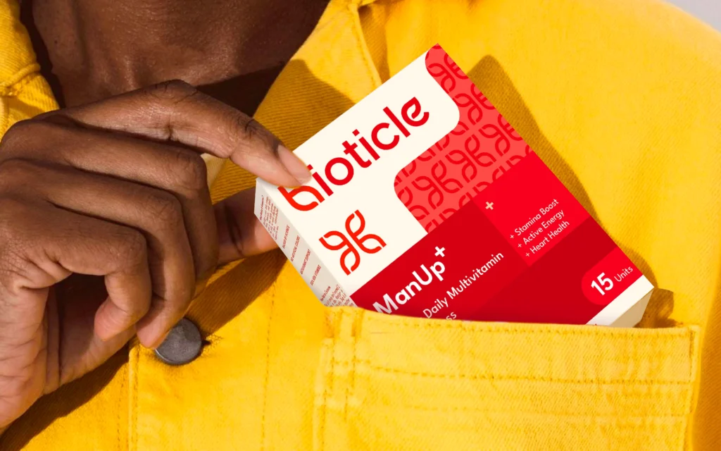 Bioticle ManUp+ multivitamin gummies - compact red box sliding into pocket - product packaging design and branding